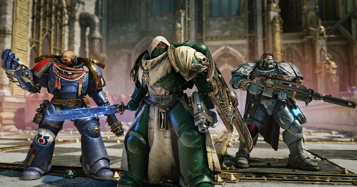 Una squadra di tre Space Marine mantiene la posizione contro le forze aliene